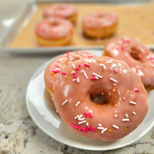 Load image into Gallery viewer, Strawberry Cheesecake Donuts